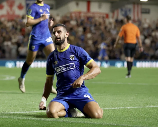 Omar Bugiel celebrates scoring