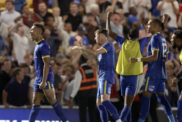 Isaac Ogundere celebrates