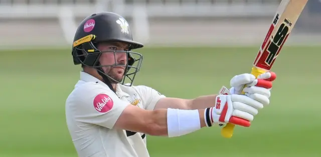 Rory Burns playing the pull shot for Surrey against Notts