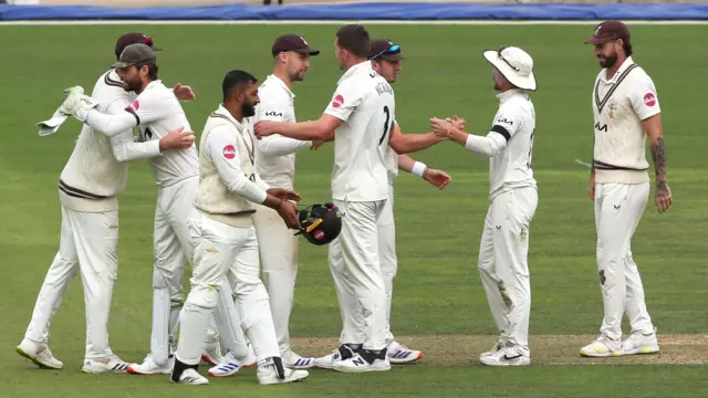 Surrey players celebrate