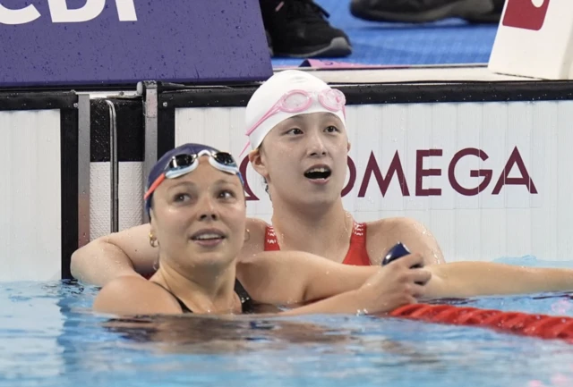 China's Yi Chen (right) alongside fifth place France's Emeline Pierre