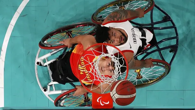 Ignacio Ortega of Team Spain shoots against Jorge Salazar of Team United States during the Men's Wheelchair Basketball Preliminary Round