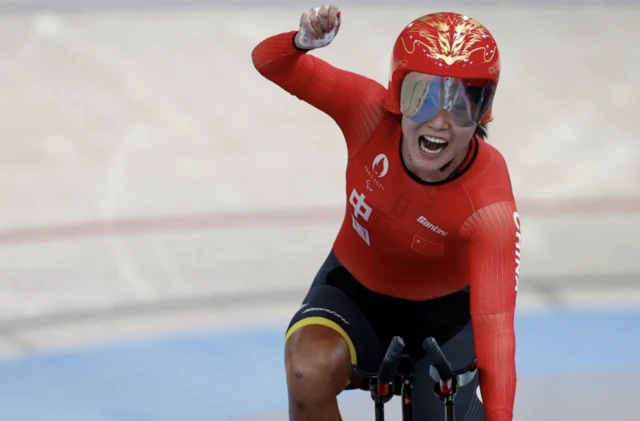 Xiaomei Wang of China celebrates