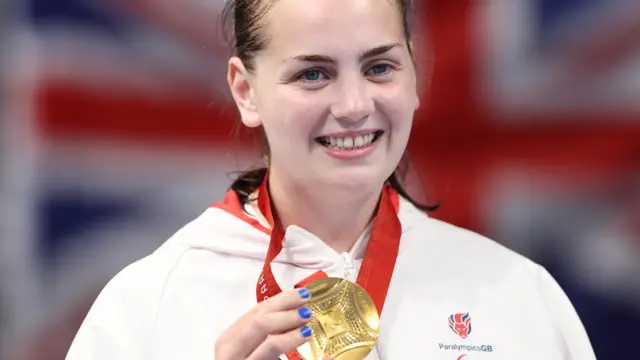 Tully Kearney holds her gold medal