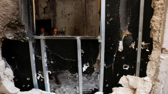 Close up showing damaged walls of a building in Tulkarm