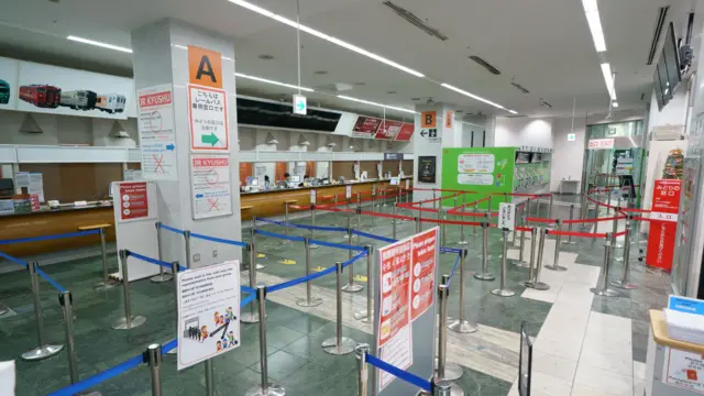 Hakata station in Fukuoka lies empty as train services ground to a halt