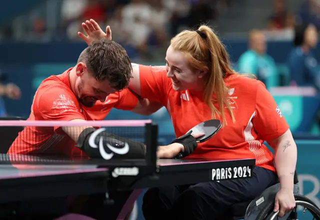 Thomas Matthews and Megan Shackleton of Team Great Britain celebrate