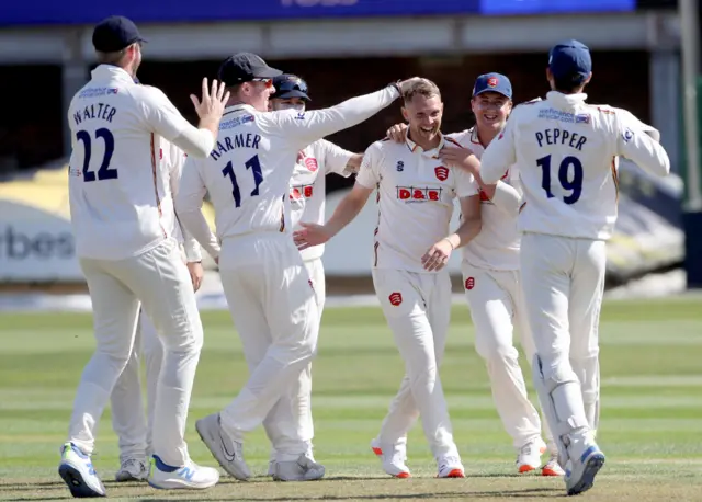 Jamie Porter celebrates with his team-mates