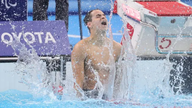 Gold Medalist Ugo Didier of Team France celebrates after winning the Swimming Men's 400m Freestyle S9 Final