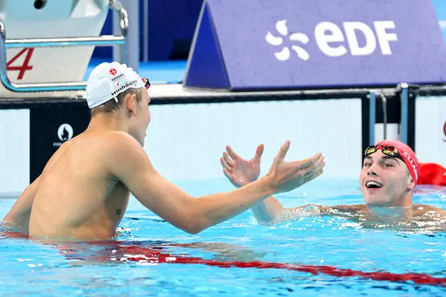 Gold Medallist Alexander Hillhouse of Team Denmark (L) embraces Silver Medallist William Ellard