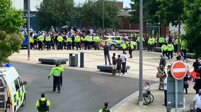 Police in Hanley, Stoke-on-Trent between rival protest groups