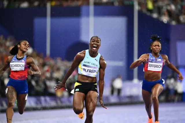 Julien Alfred wins gold in 100m