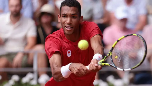 Felix Auger-Aliassime in action at the Olympics