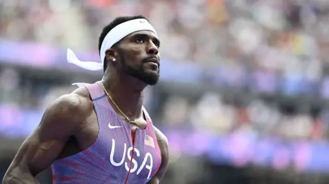 US' Kenneth Bednarek reacts after competing in the men's 100m heat of the athletics event at the Paris 2024 Olympic Games at Stade de France