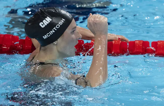 McIntosh punches the air after her win