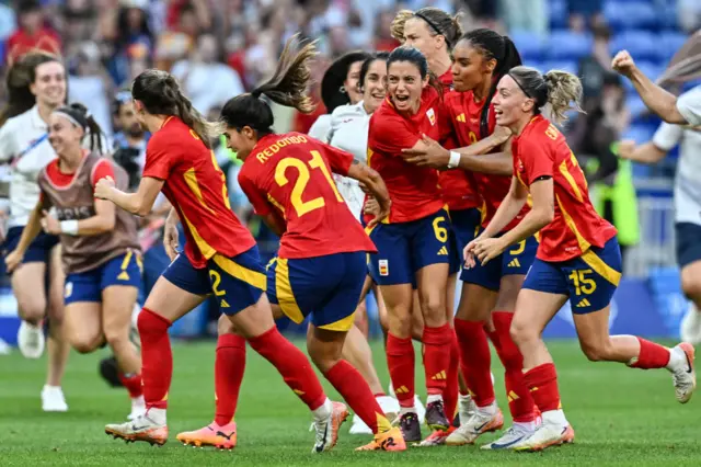 Spain celebrate penalty shootout win