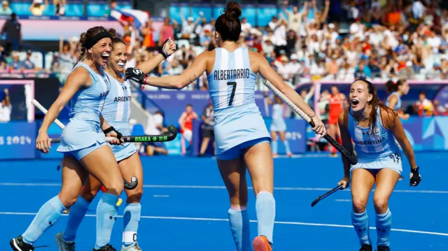 Argentina's players celebrate after Agustina Albertarrio scores against Great Britain at the Paris 2024 Olympics