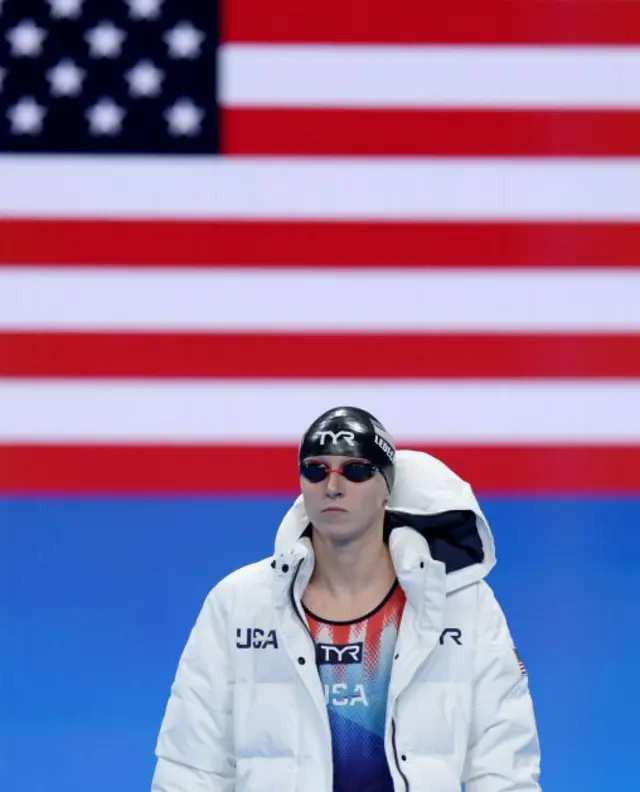 Ledecky walks out to the poolside