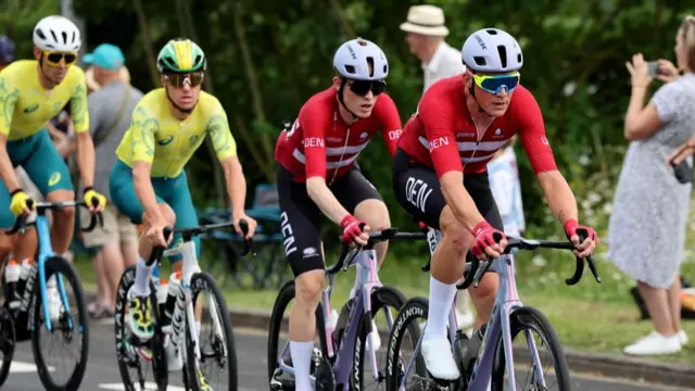 Mattias Skjelmose and Mads Pedersen riding during the men's road race at the Paris 2024 Olympics