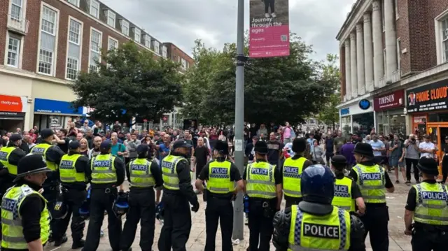 Police and protesters in Hull