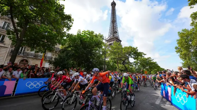 Cyclists riding during the men's road race at the Paris 2024 Olympics