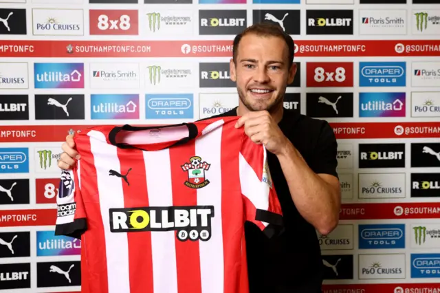 Ryan Fraser holds up a Southampton shirt