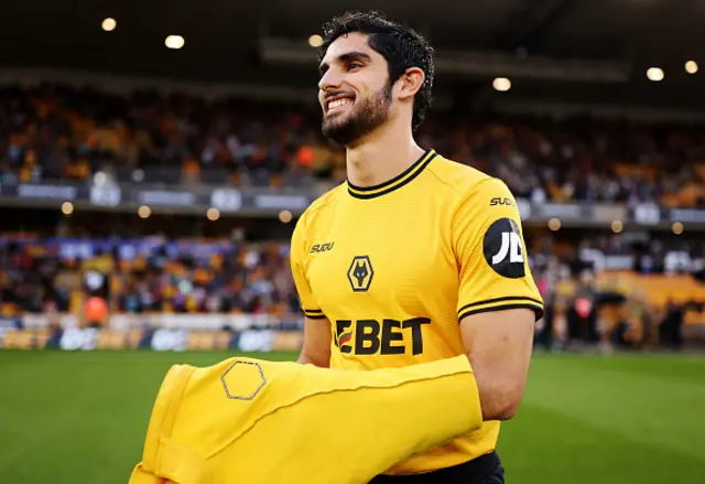 Goncalo Guedes looks on