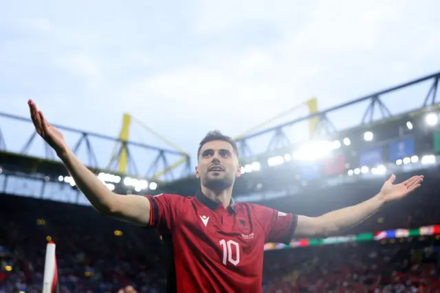 Nedim Bajrami celebrates scoring his team's first goal during Euro 2024 against Italy