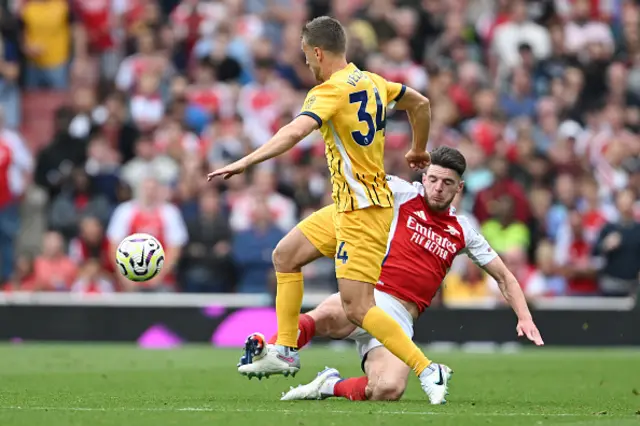 Joel Veltman of Brighton & Hove Albion is challenged by Declan Rice