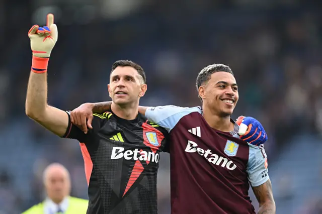 Emiliano Martinez and Morgan Rogers of Aston Villa celebrates