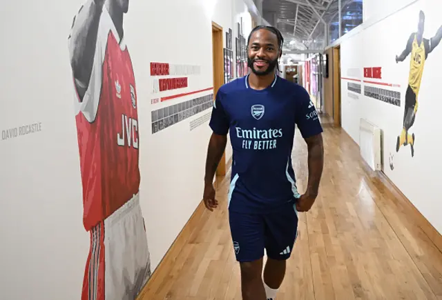 Arsenal unveil new signing Raheem Sterling