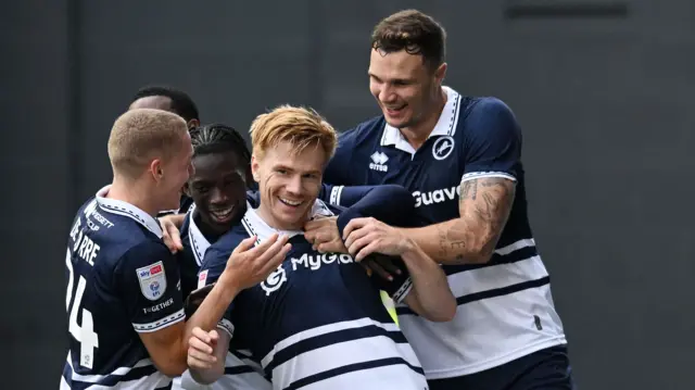 Millwall celebrate Duncan Watmore's goal