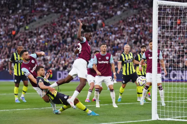 Ruben Dias sees a shot go wide of the post