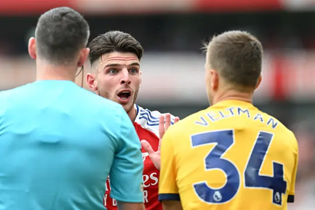 Declan Rice of Arsenal interacts with Joel Veltman