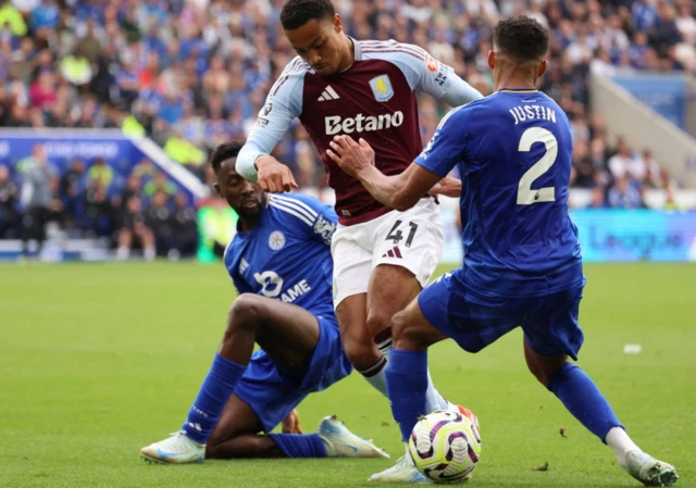 Jacob Ramsey in action with Leicester City's James Justin R