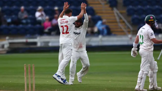 Ned Leonard celebrates a wicket