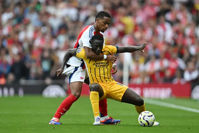 Yankuba Minteh of Brighton & Hove Albion is challenged by Jurrien Timber