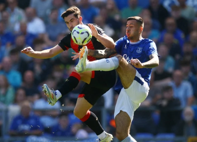 Dwight McNeil in action with AFC Bournemouth's Lewis Cook