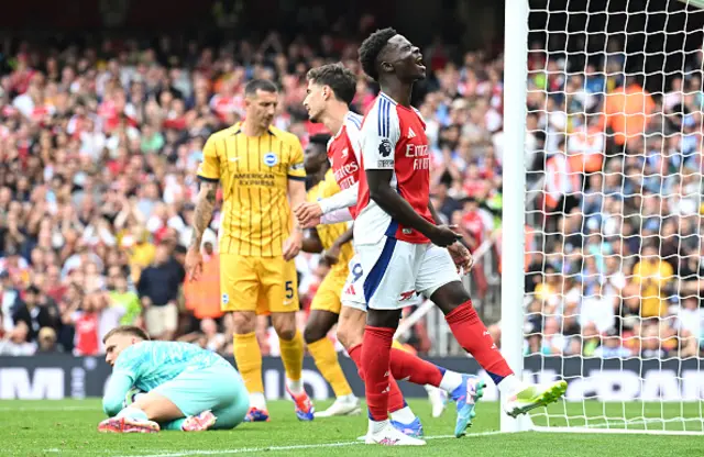 Bukayo Saka of Arsenal reacts