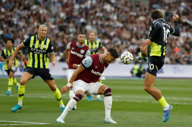 Jack Grealish vies with  Konstantinos Mavropanos