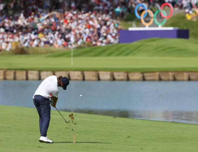 Fleetwood smashes the ball towards the green