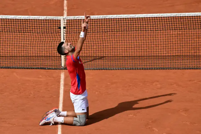 Serbia's Novak Djokovic reacts to beating Spain's Carlos Alcaraz