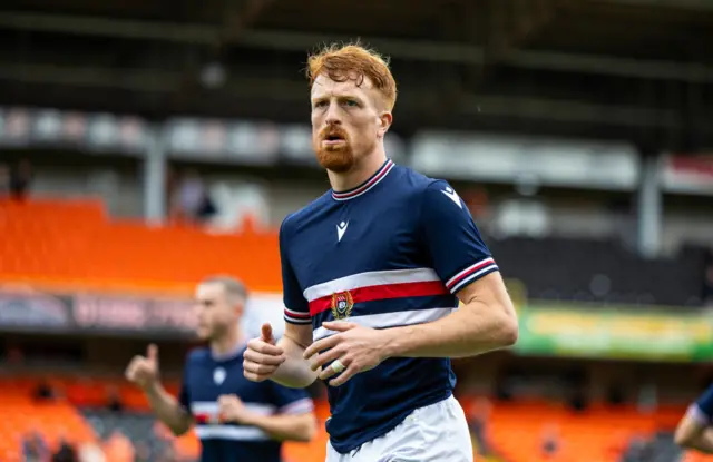 Simon Murray warming up at Tannadice