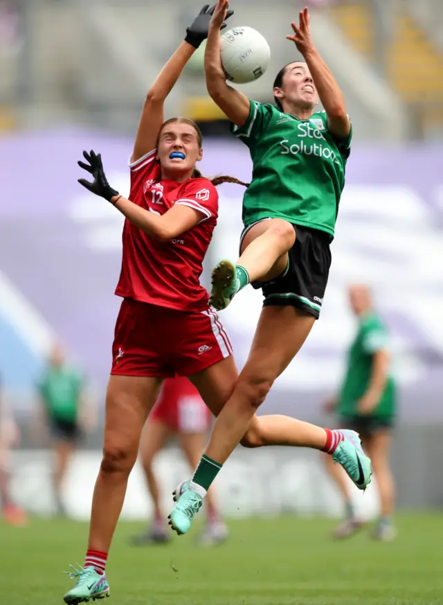 Claire McDonald competes with Fermanagh's Blaithin Bogue for a high ball