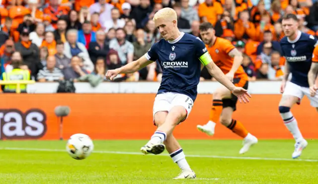 Luke McCowan scores from the penalty spot