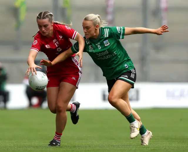 Shannan McQuade tackles Niamh Rice