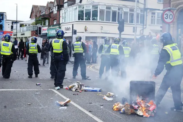 Police officers during an anti-immigration protest in Middlesbrough. Picture date: Sunday August 4, 2024. PA Photo