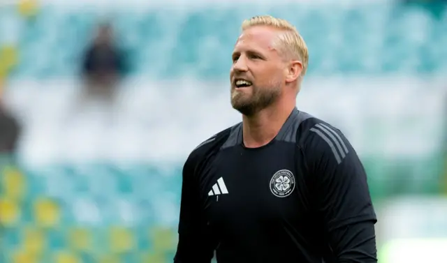 Kasper Schmeichel warms up at Celtic Park