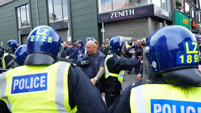 Police officers and protestors in Middlesborough