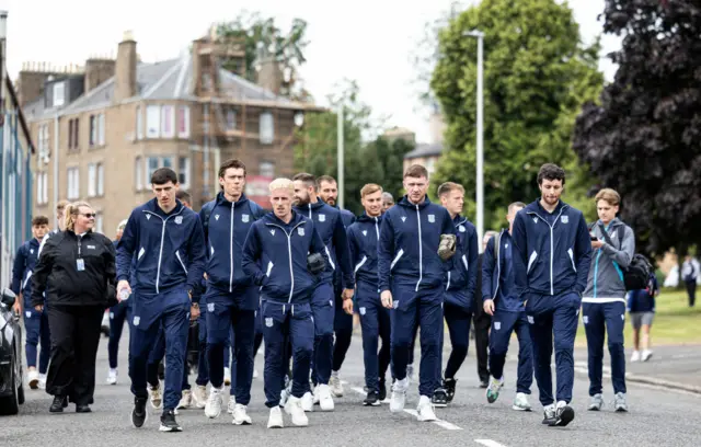 Dundee players make the short walk to Tannadice